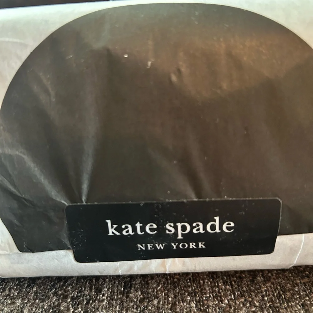 NWT- Kate Spade L- Zip White wallet. In wrapper.